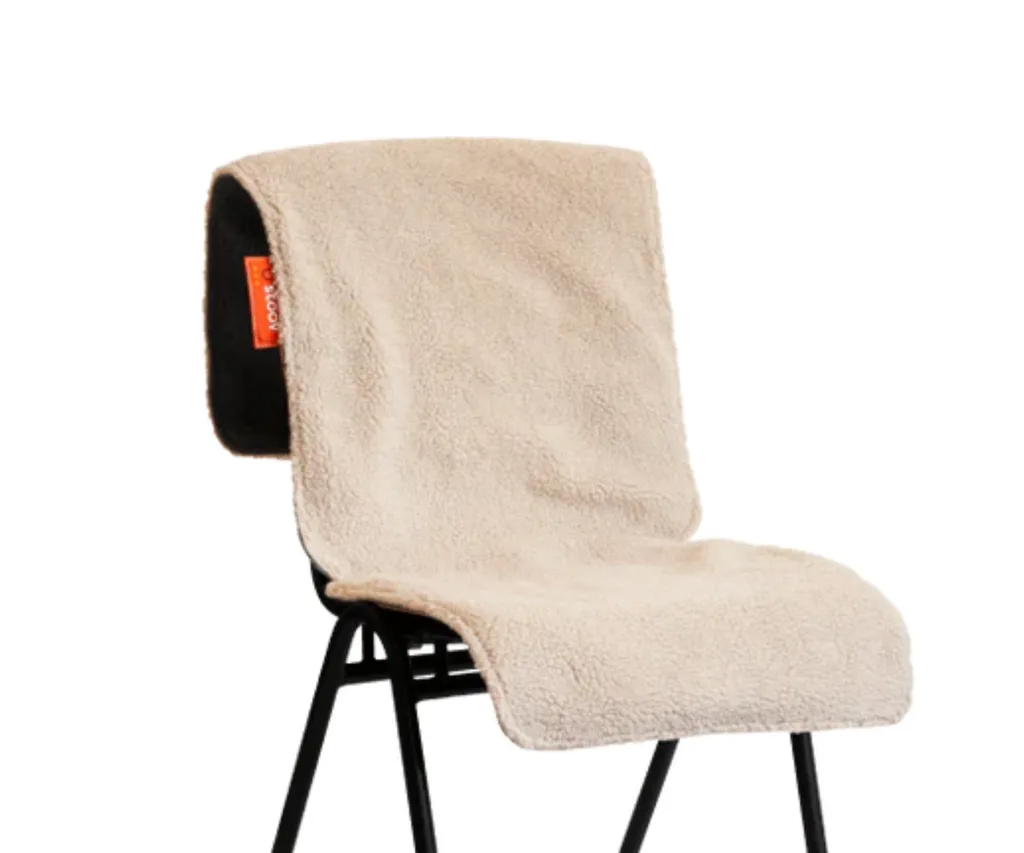 heated pad wool material sitting on chair