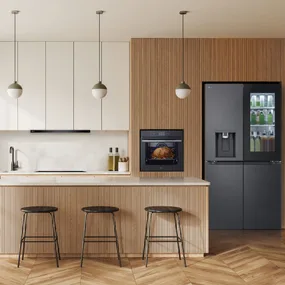 Lg kitchen appliances in time style kitchen with island bench and pendant lighting