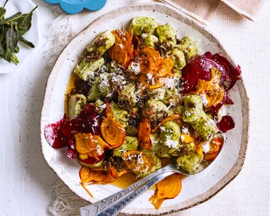 gnocchi with beetroot and chestnuts in a bowl