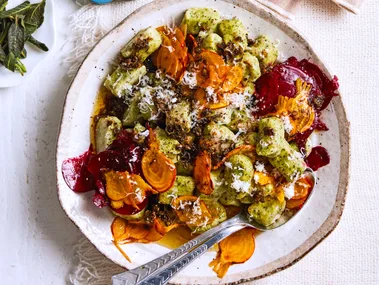 gnocchi with beetroot and chestnuts in a bowl