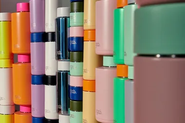 Stack of Frank Green drinkware in various colours, available with a Frank Green discount code