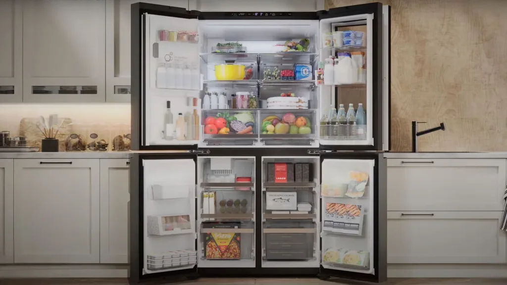 An image of the LG 642L French Door Fridge with InstaView in a kitchen, with all the doors open to illustrate how much space there is.