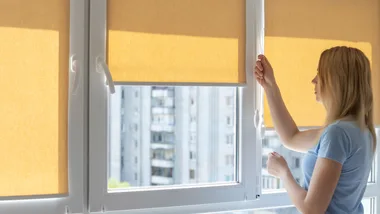 yellow roller blinds over window