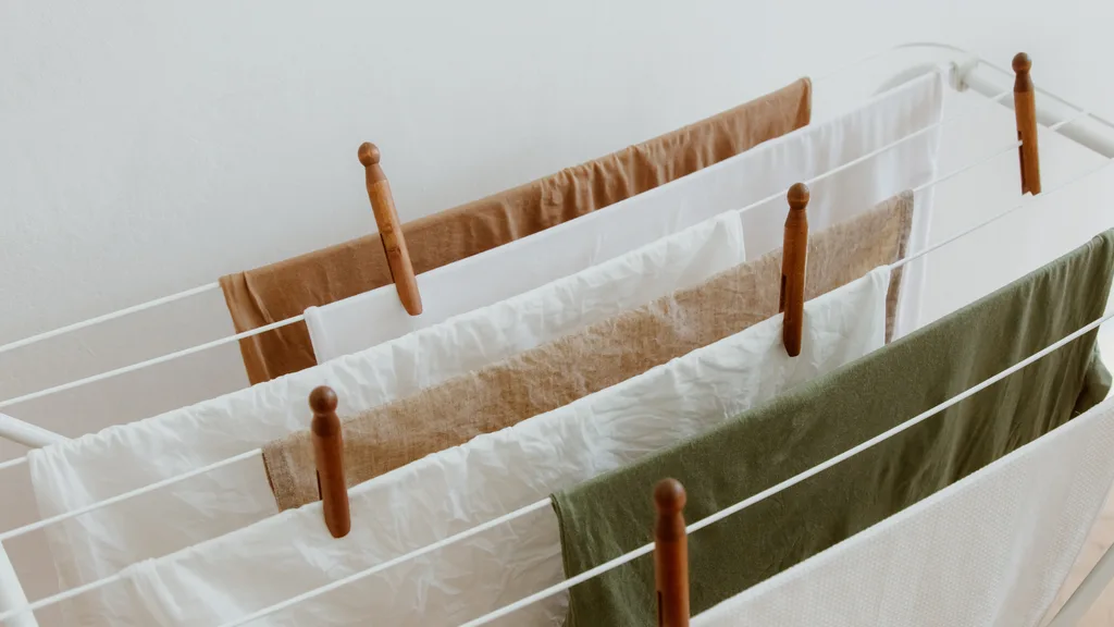 towels hanging on a clothes horse