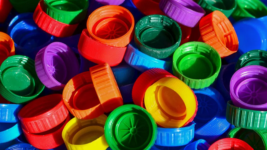 coloured bottle lids ready for recycling