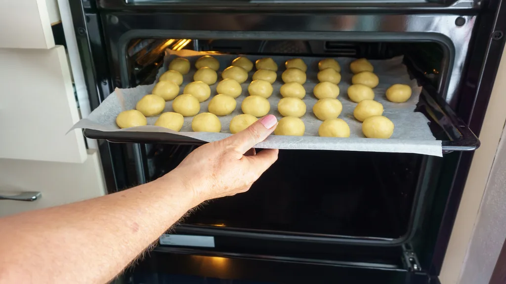 cookie dough going into the oven