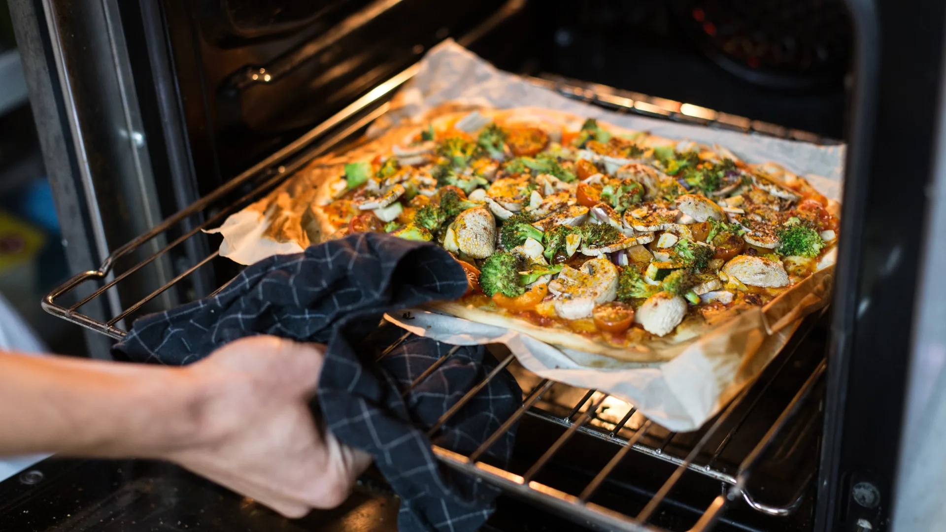 pizza cooking on oven