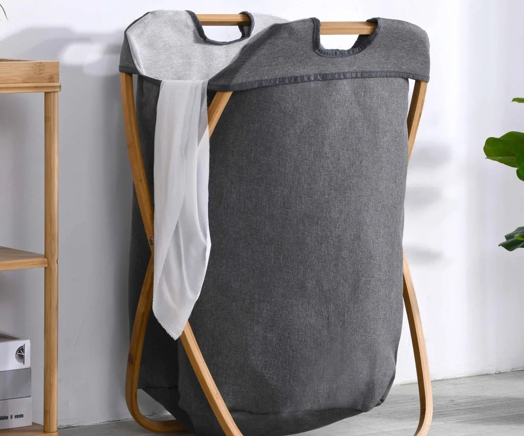 grey foldable laundry hamper with handles and bamboo frame