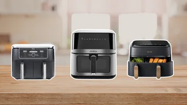 ninja air fryer, philips and sunbeam airyfryer sitting on a bench