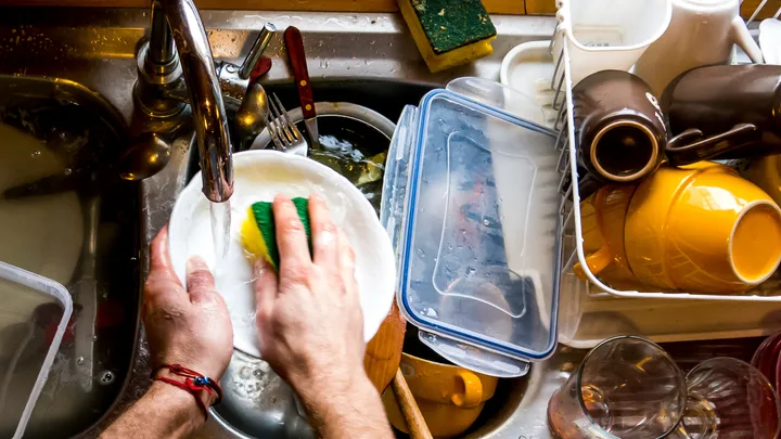 sink full of dirty dishes