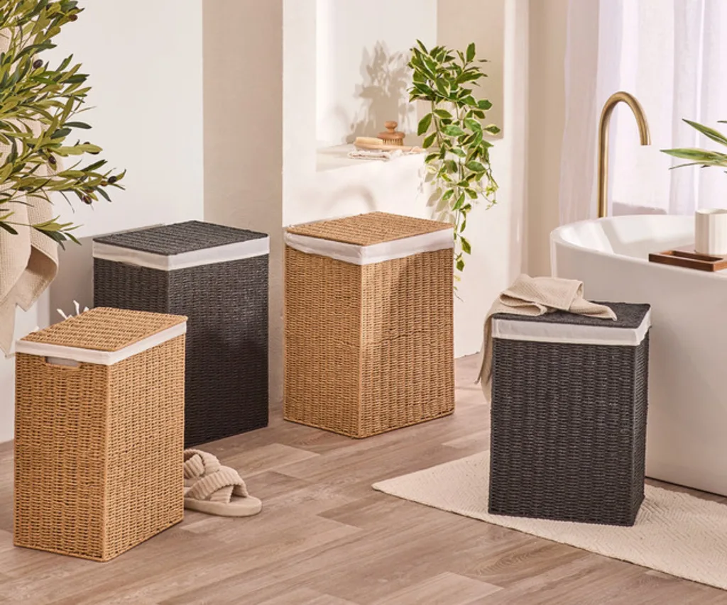 multiple wicker woven laundry baskets with cotton lining in bathroom