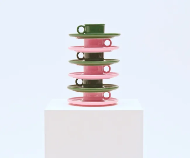 vinterfint cup and saucer in pink and green stacked on top of each other