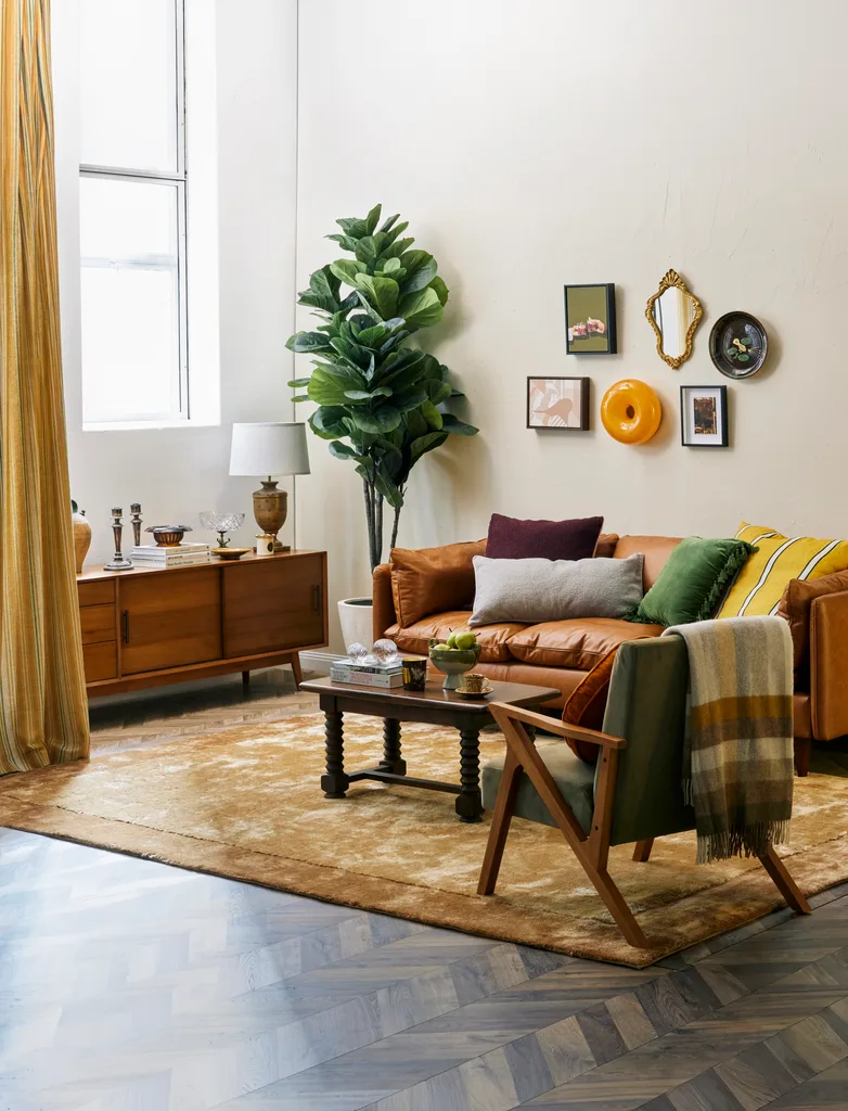 mid century 70s style lounge room with shag rug brown leather sofa and vintage decor modern homes styling