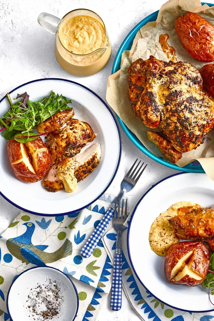colins campfire chicken in white bowls on a blue and white tablecloth