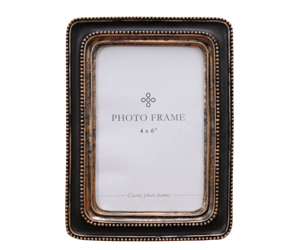 small photo frame with metal beaded edging and rounded corners