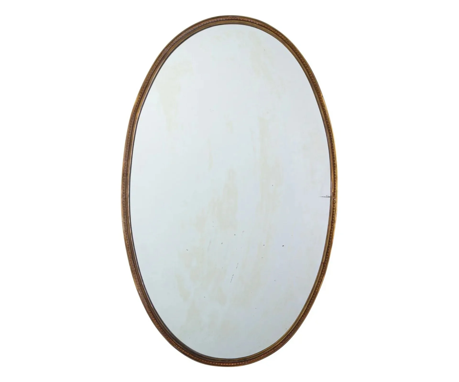 oval brass mirror with small beading around the edge