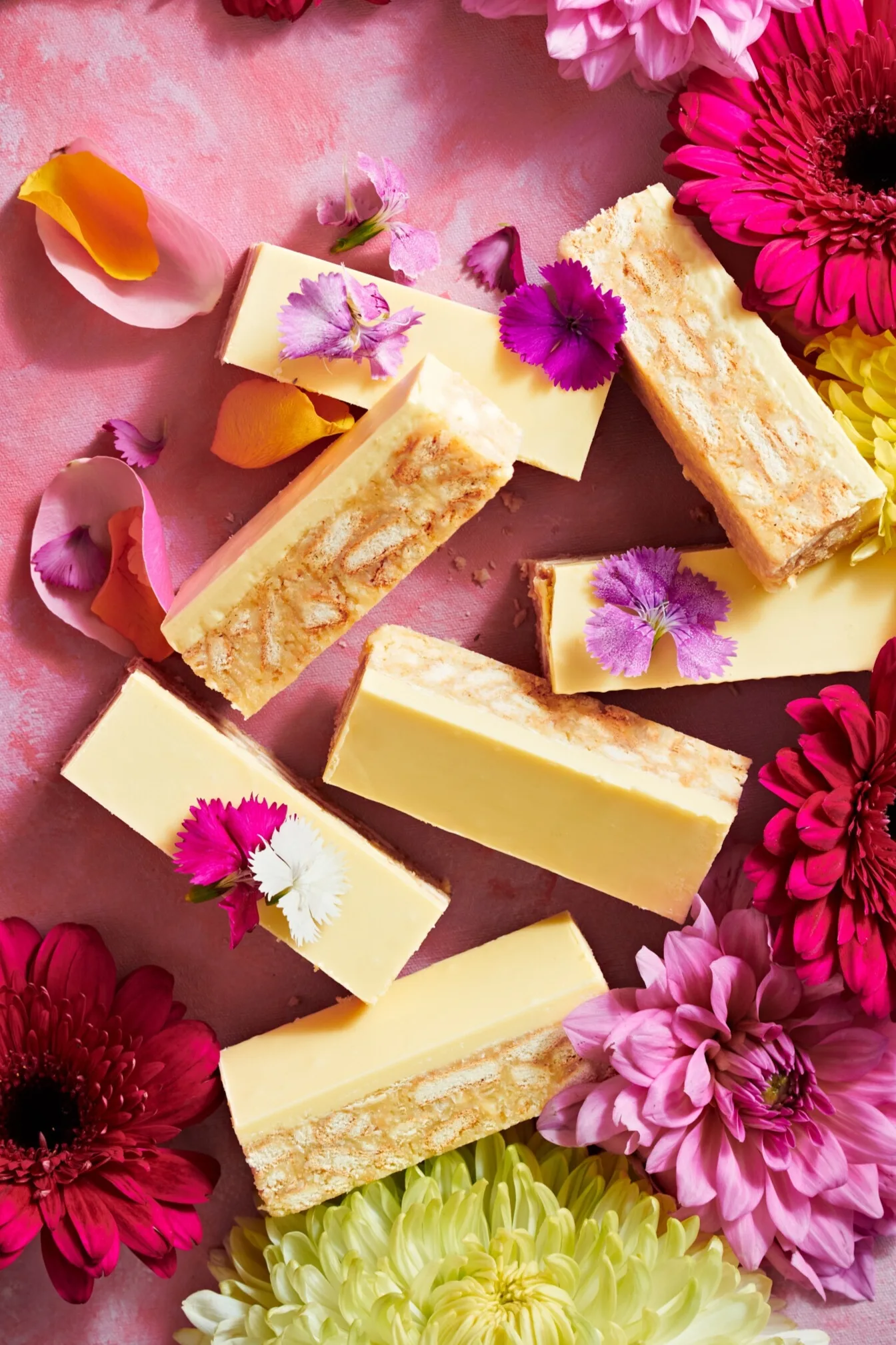 White choc hedgehog slice surrounded by pink flowers