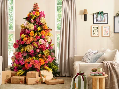 BHG Editor creates a Christmas tree that’s full of festive flowers