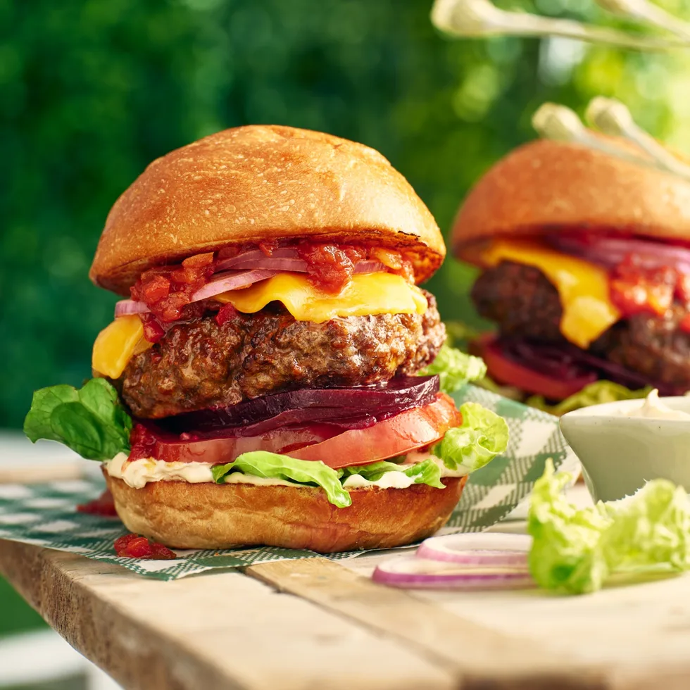 A big beef burger with French onion sauce, cheese, beetroot, onions and salad