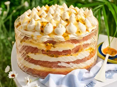 A lemon tiramisu cake in a glass dish.