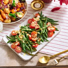 Air fryer vegie salad with toasted hazlenuts and air fried crispy beans and almonds with roast garlic dressing