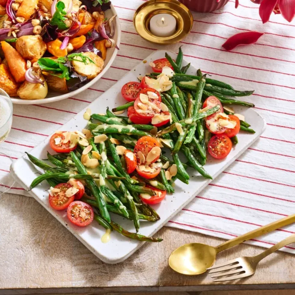 Air fryer vegie salad with toasted hazlenuts and air fried crispy beans and almonds with roast garlic dressing