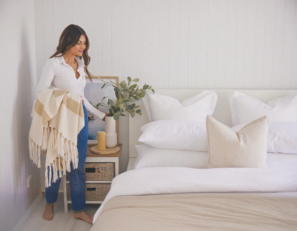 Professional home organiser Chantal Mila decluttering a bedroom