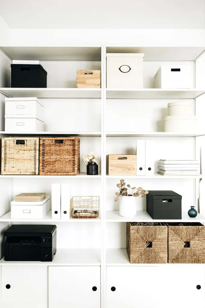 Home office shelving unit with boxes for storing papers