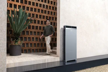 man walking past anker solix x1