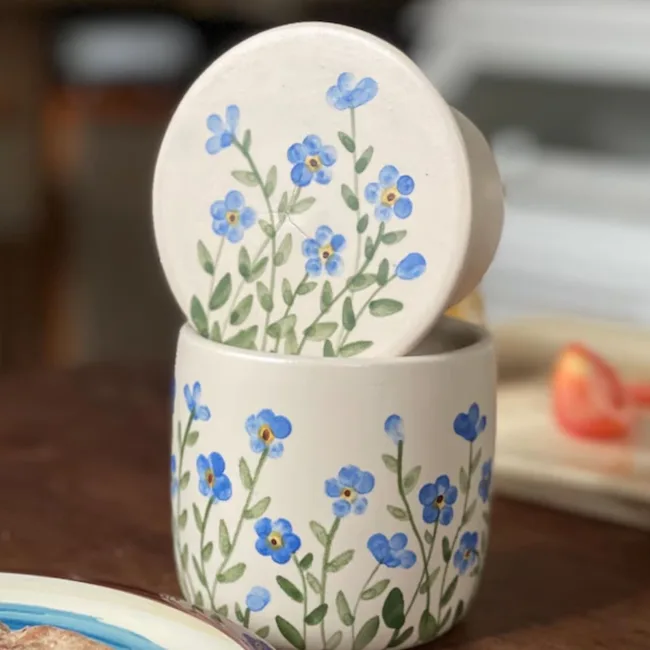 etsy handmade butter bell with forget me nots painted on it