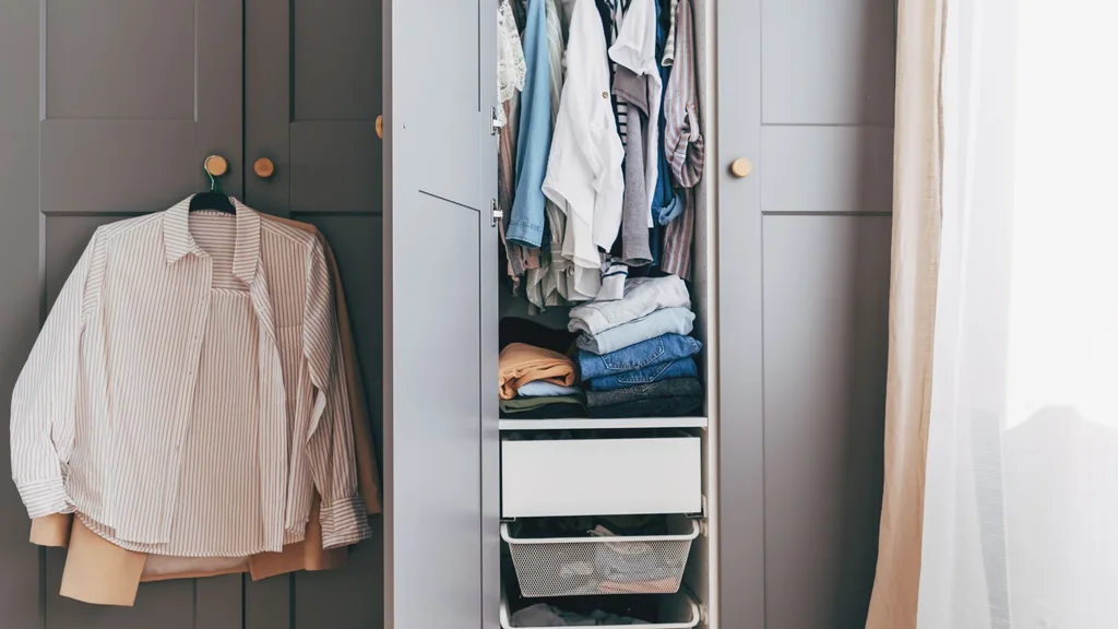 Wardrobe open with outfit hanging
