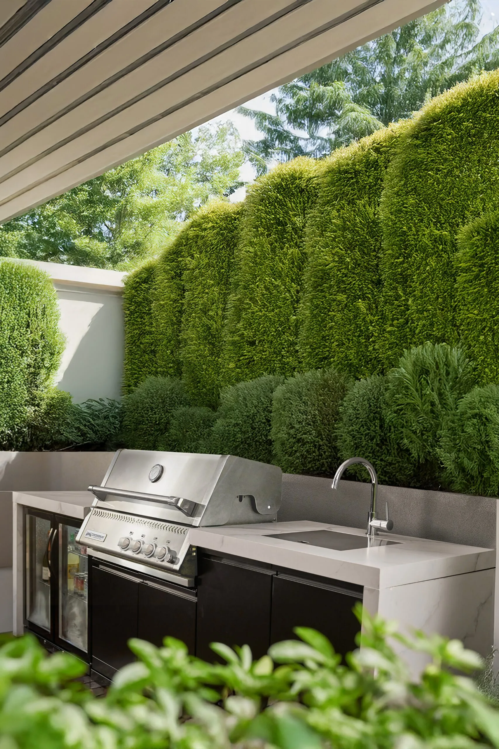 Crossray outdoor barbecue kitchen with white, silver benchtop.