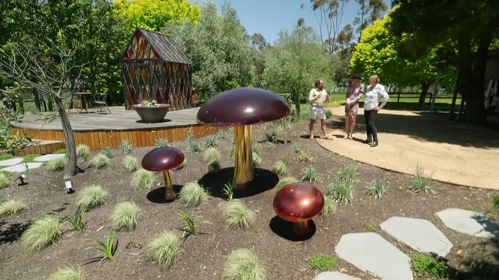 millie savage mushroom sculptures in garden