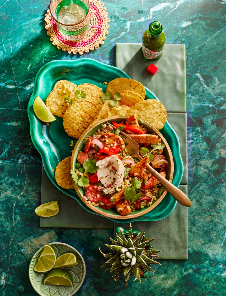 one pan fajitas with capsicum and tortilla chips on the side