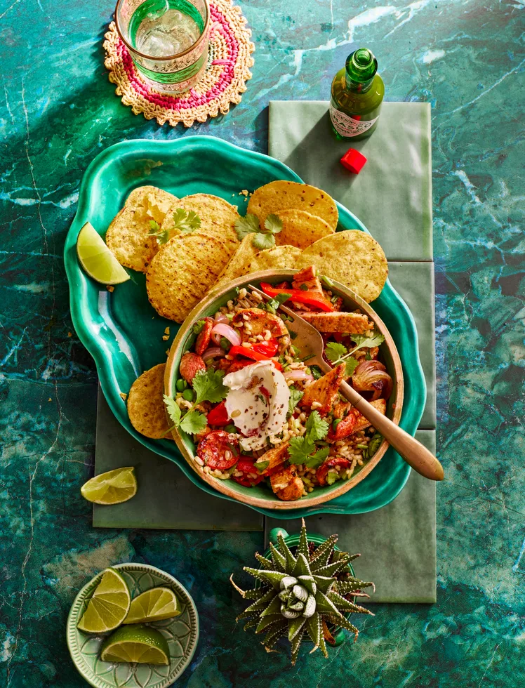 one pan fajitas with capsicum and tortilla chips on the side
