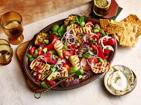 mediterranean salad with haloumi eggplant and pomegranate