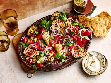 mediterranean salad with haloumi eggplant and pomegranate