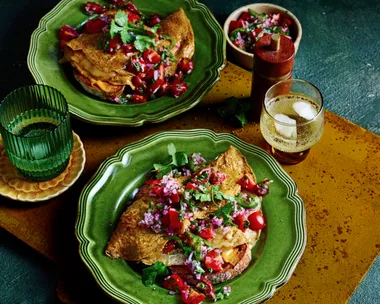cherry tomato pico de gallo with mexican eggs in two green bowls
