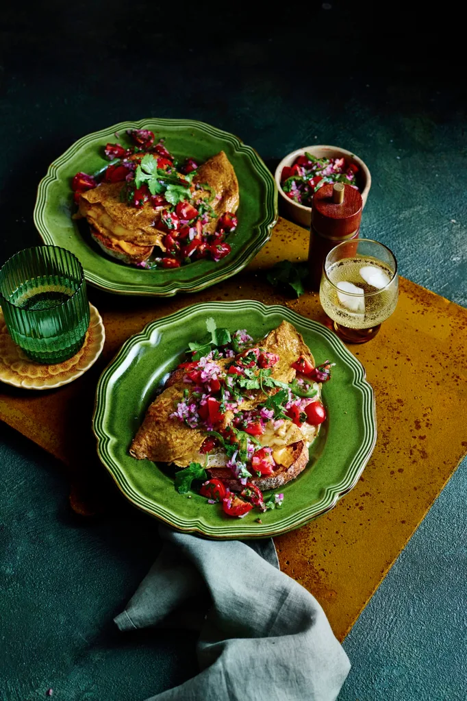 cherry tomato pico de gallo with mexican eggs in two green bowls