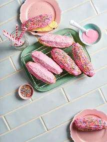 Homemade finger buns sprinkled with hundreds and thousands and shredded coconut in the style of an Australian bakery
