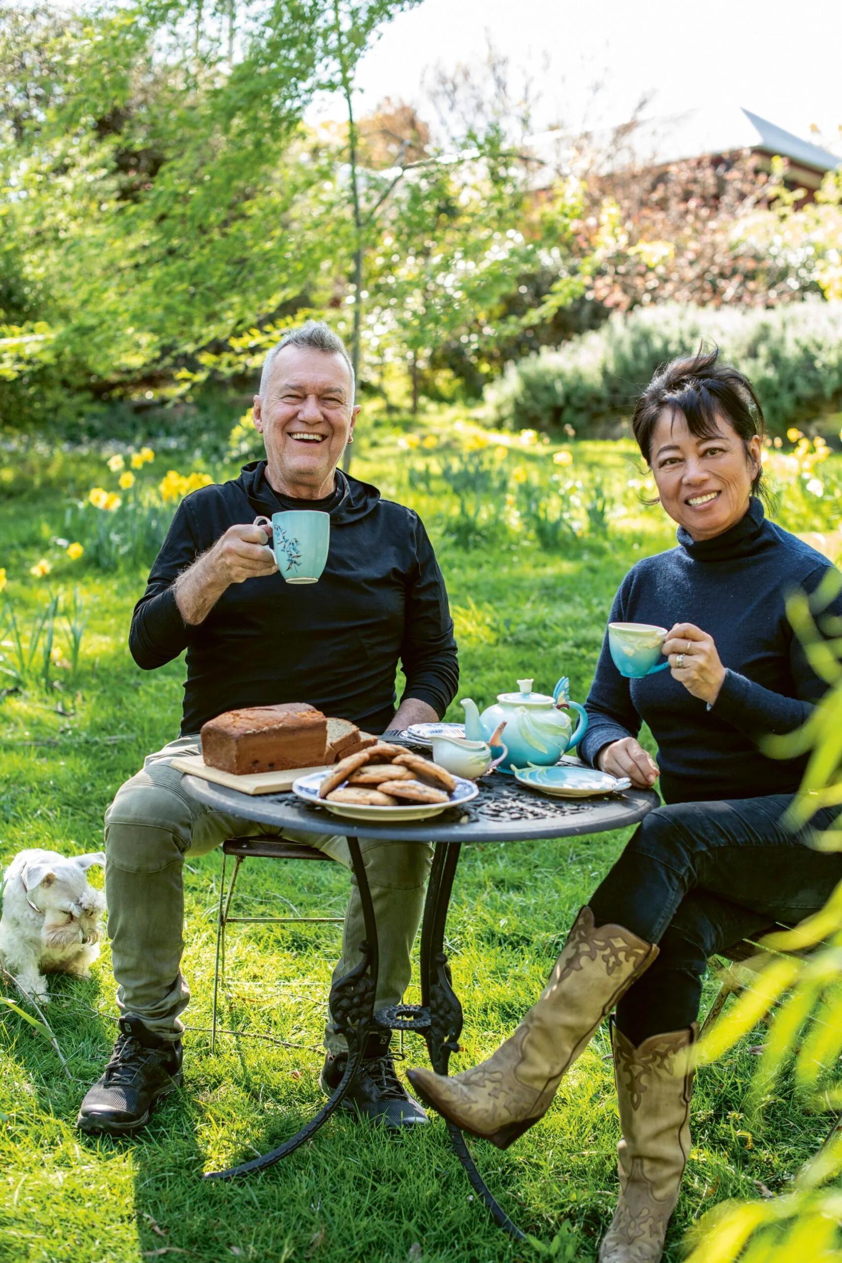 Jimmy Barnes and Jane Barnes drinking tea togerther outdoors at their home