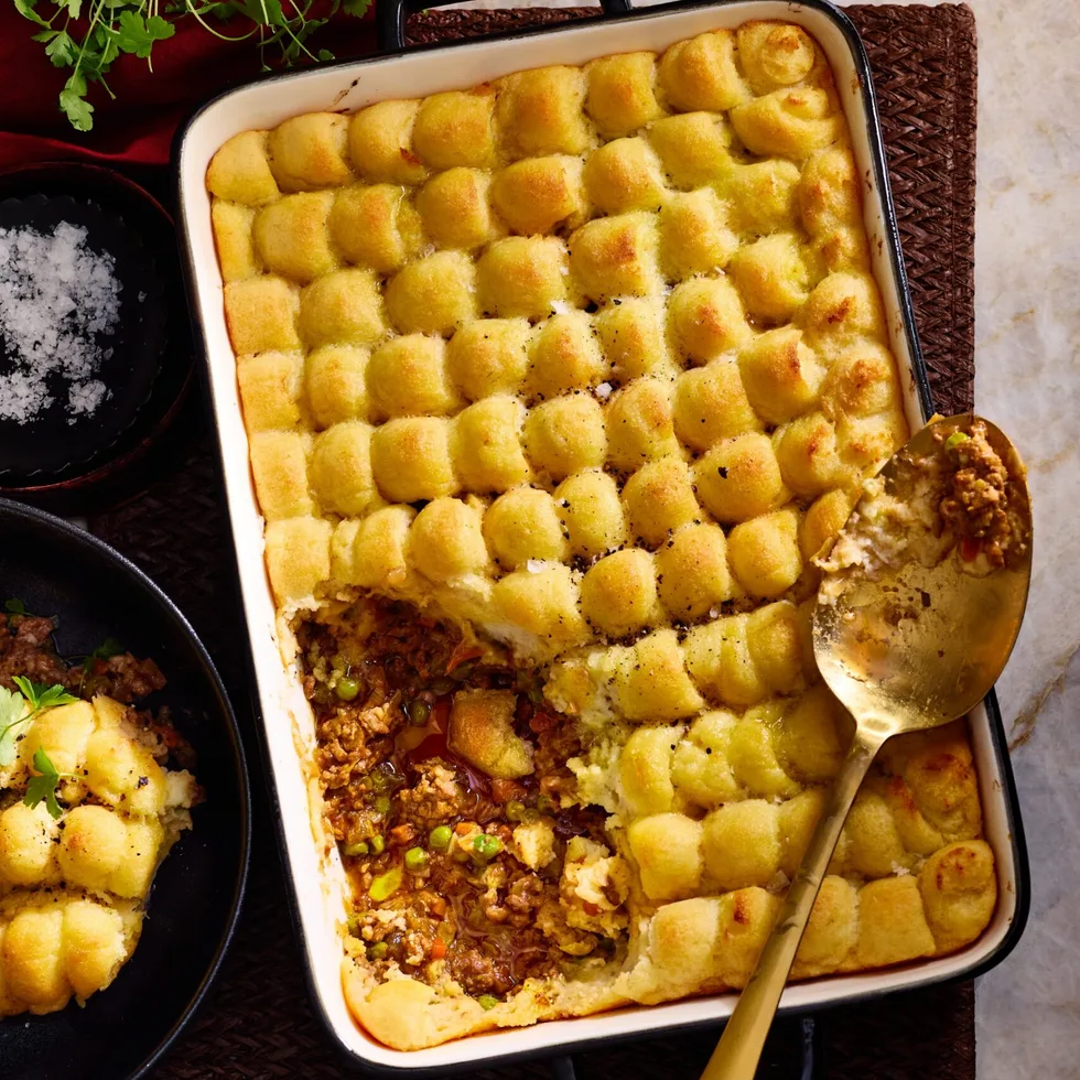 matt morans shepherd's pie with piped mashed potato on top and spoon of filling exposed