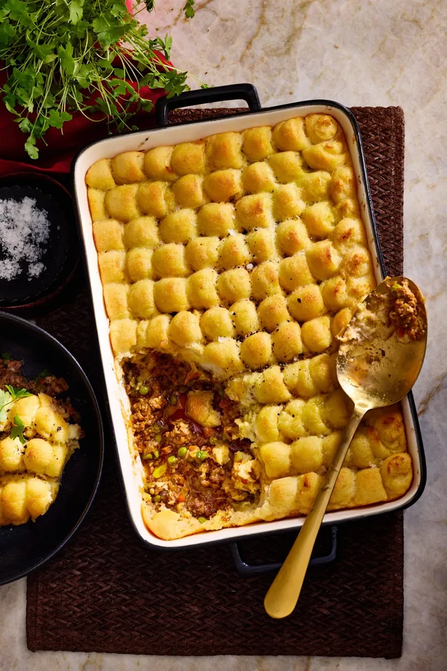 matt morans shepherd's pie with piped mashed potato on top and spoon of filling exposed