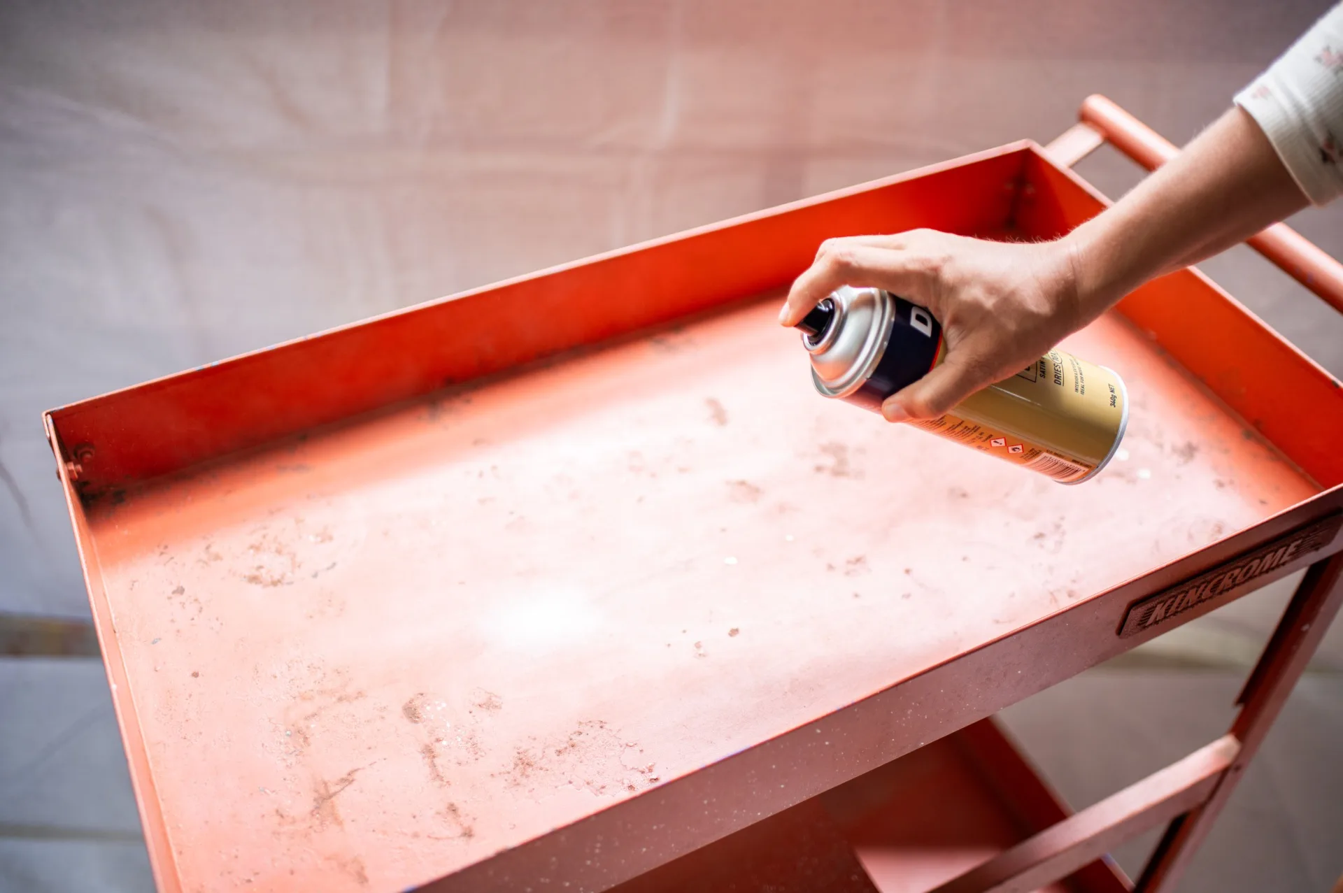 Spray painting old trolley