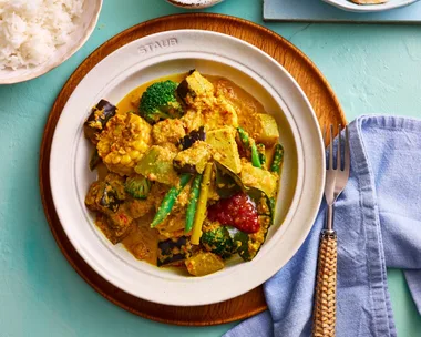 coconut vegetable stew from clarissa feidel with broccoli cabbage and an orange curry sauce