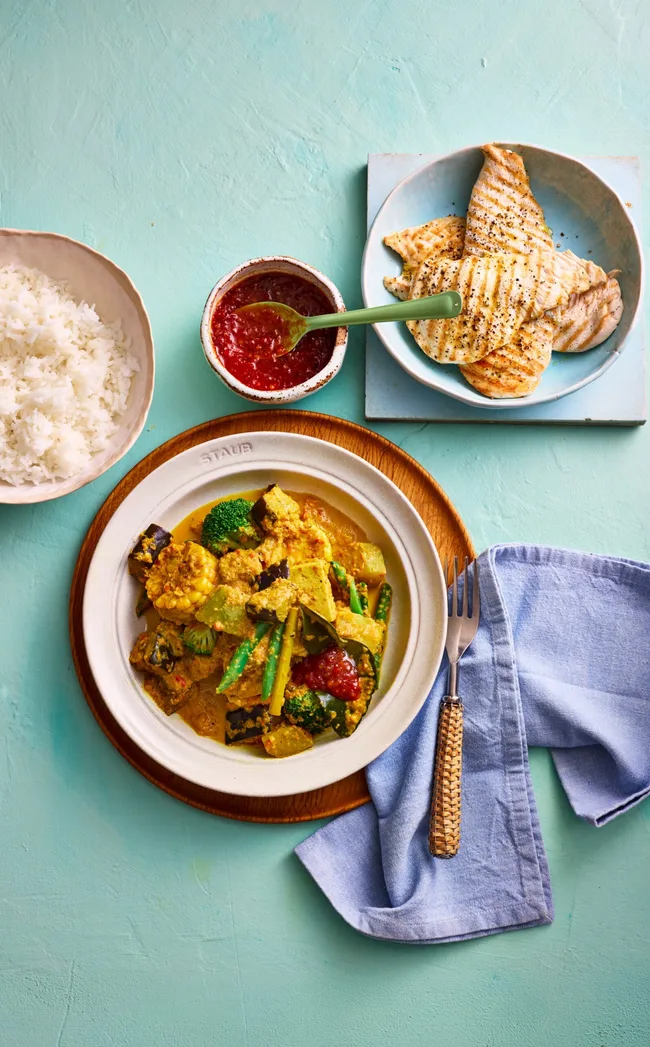 coconut vegetable stew from clarissa feidel with broccoli cabbage and an orange curry sauce