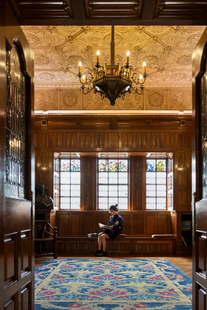 shakespeare room in the state library with stained glass window and lady reading