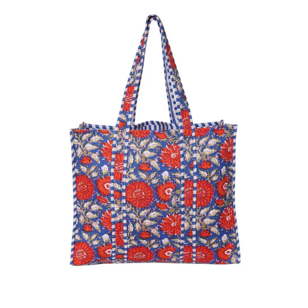 esty tote bag that is hand blocked and printed with blue red and white floral pattern