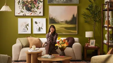 BHG Editor Meg in Fantastic Furniture Living Room