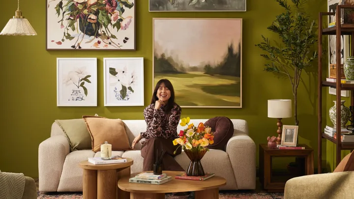 BHG Editor Meg in Fantastic Furniture Living Room